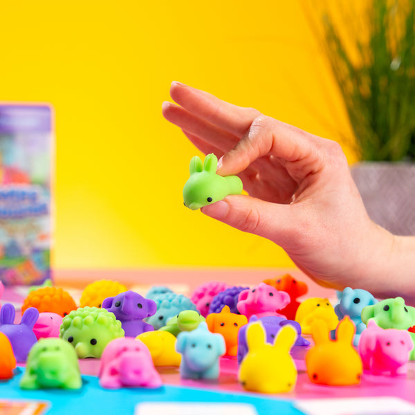 Sensory board game for kids featuring tactile squishy, animal and colour recognition, and fine motor skill development