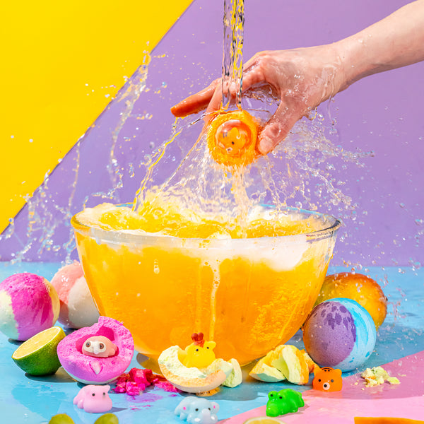 Fizzing bath bombs for kids with calming scents and sensory squishy toy hidden in each bath fizzer for surprise-filled bathtime
