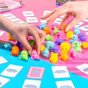 Swipe the Squishie sensory board game encouraging reaction speed, pattern recognition, and screen-free playtime for kids. Sensory board game for kids featuring tactile squishy, animal and colour recognition, and fine motor skill development