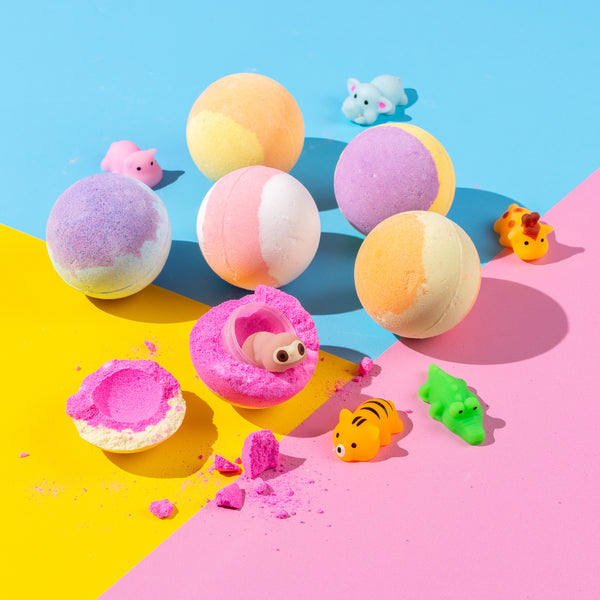 Children’s bath bomb gift set with vibrant fizz, fun scents like strawberry and passion fruit, and surprise squishie toys inside each one